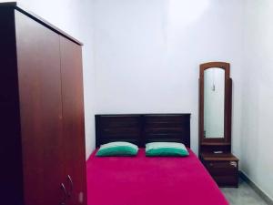 Letto o letti in una camera di The Beach House , Nilaveli , Trincomalee