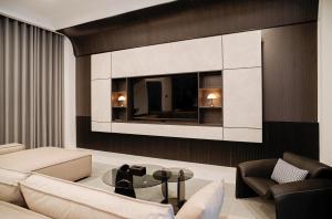 a living room with a couch and a table at B-Villa Vung Tau in Vung Tau