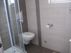 Koupelna v ubytování Apartments Žara