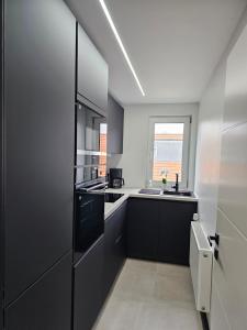 Η κουζίνα ή μικρή κουζίνα στο Moderne 3 Zimmer Wohnung