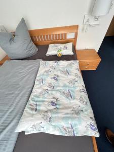 Postel nebo postele na pokoji v ubytování Hotel Gästehaus Linden