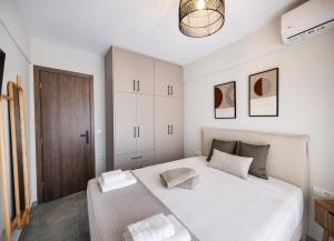 Postel nebo postele na pokoji v ubytování Aqua Bliss