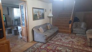 Area soggiorno di Дом гостевой Для семьи