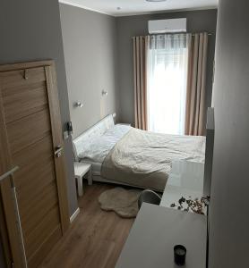 Posteľ alebo postele v izbe v ubytovaní Apartament Mushellka - Dziwnówek Horizon Park , 2 sypialnie i salon