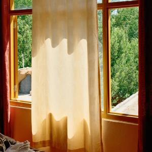Postel nebo postele na pokoji v ubytování Dey-Khang Homestay