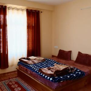 Postel nebo postele na pokoji v ubytování Dey-Khang Homestay