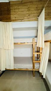 Postel nebo postele na pokoji v ubytování Yaya Casa + 13 fotografií