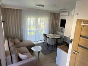 Posedenie v ubytovaní Apartament Mushellka - Dziwnówek Horizon Park , 2 sypialnie i salon