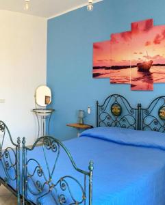 Giường trong phòng chung tại casa il carretto