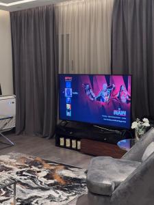 Televisyen dan/atau pusat hiburan di Apartment in Dreamland