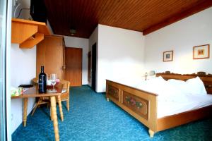 Postel nebo postele na pokoji v ubytování Hotel Sonnleitn