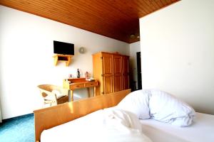 Postel nebo postele na pokoji v ubytování Hotel Sonnleitn
