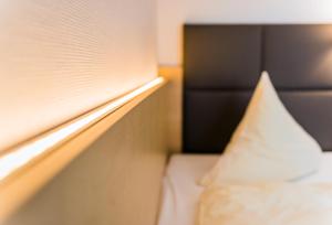 Postel nebo postele na pokoji v ubytování Hotel Lücke Rheine