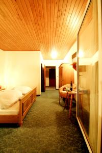 Postel nebo postele na pokoji v ubytování Hotel Sonnleitn