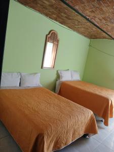 Postel nebo postele na pokoji v ubytování Casa Rousse