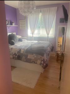 Ένα ή περισσότερα κρεβάτια σε δωμάτιο στο Welcoming homestay with relaxing private room