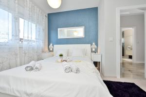 Łóżko lub łóżka w pokoju w obiekcie Luxury Apartments Marija