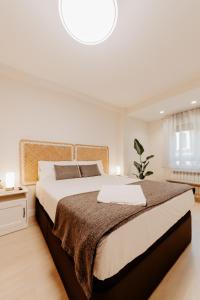 Ένα ή περισσότερα κρεβάτια σε δωμάτιο στο Sarmientos Home