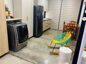 Kuchyň nebo kuchyňský kout v ubytování Apartamento Loft cerca del aeropuerto + 5 fotografií