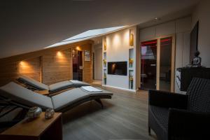 TV a/nebo společenská místnost v ubytování Hotel Lücke Rheine