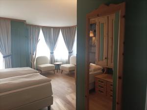 Postel nebo postele na pokoji v ubytování Hotel Meierhof