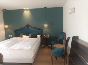 Postel nebo postele na pokoji v ubytování Hotel Meierhof