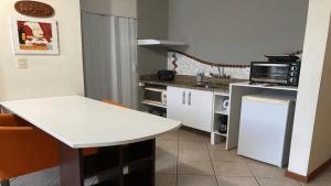 Dapur atau dapur kecil di Saint Sebastian Flat 614 - Com Hidro! até 3 pessoas, Duplex, no centro