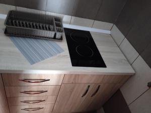 Kuchyň nebo kuchyňský kout v ubytování Apartmani Studio