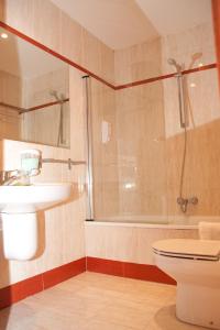 Kúpeľňa v ubytovaní Hotel Cuéntame