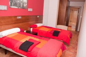 Posteľ alebo postele v izbe v ubytovaní Hotel Cuéntame