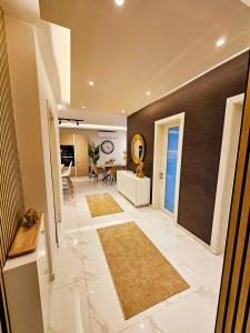 En eller flere senge i et værelse på Delmar Coastal Retreat