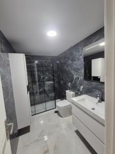 Kúpeľňa v ubytovaní Porto fino almerimar