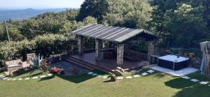an aerial view of a garden with a gazebo at IVO house in Vezza