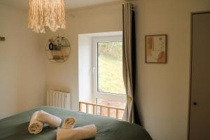 Postel nebo postele na pokoji v ubytování Duplex vue sur les montagnes - Orbey