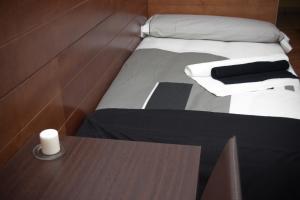 Posteľ alebo postele v izbe v ubytovaní Hotel Cuéntame