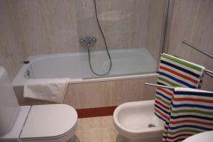 Kúpeľňa v ubytovaní Hotel Cuéntame