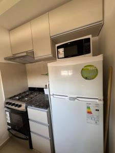 Η κουζίνα ή μικρή κουζίνα στο Depto En ATRIUM Sarmiento hasta 4 Personas