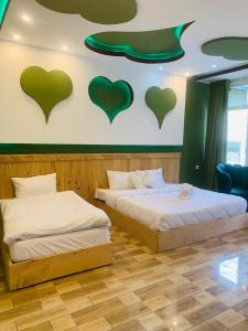 Postel nebo postele na pokoji v ubytování chinar resort