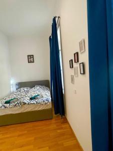 Ένα ή περισσότερα κρεβάτια σε δωμάτιο στο Perfect location! Large apartment in Klagenfurt center