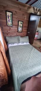 A bed or beds in a room at Cabañas Los Profes