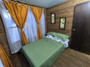 A bed or beds in a room at Cabañas Los Profes