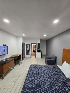 Μια τηλεόραση ή/και κέντρο ψυχαγωγίας στο Executive Inn Laguna Vista
