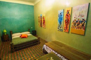 
Cama o camas de una habitación en Riad Zinoun & Spa 9 Rooms
