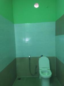 Ένα μπάνιο στο Thodiyel Home Stay