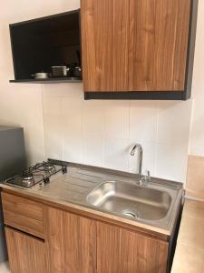 Kuchyň nebo kuchyňský kout v ubytování Apartahotel el templete cyc