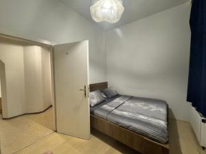 Ένα ή περισσότερα κρεβάτια σε δωμάτιο στο 1100 Wien Ganze Unterkunft 1