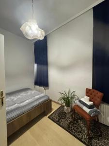 Ένα ή περισσότερα κρεβάτια σε δωμάτιο στο 1100 Wien Ganze Unterkunft 1