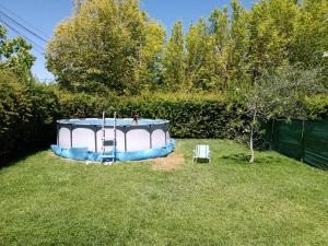 a small circular object in the middle of a yard at Casa Huerta in Vista Flores