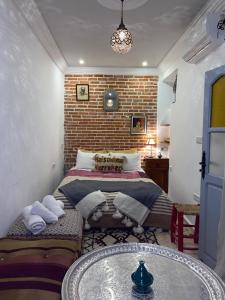 Postel nebo postele na pokoji v ubytování Maison Imane Marrakech