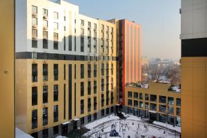 an aerial view of buildings in a city at Central Light Apartment in Almaty